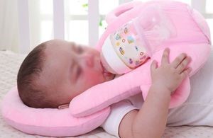 Image of a baby using a self feeding pillow