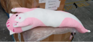 This image shows a pink plush cat pillow.