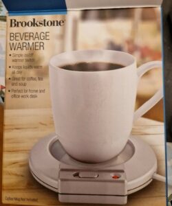 This image shows a Brookstone Beverage Warmer.