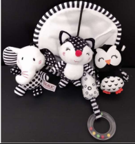 This image shows a Tololo hanging black and white umbrella children's toy.