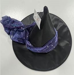A child's Halloween black witches hat with a purple ribbon