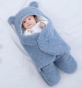 This image shows a blue baby wrap sleeping bag.