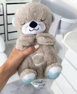 Image shows Breathing Otter plush toy
