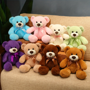 multiple plush teddy bears in various colours wearing bow ties