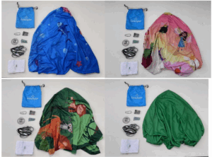 A collage of four product sets arranged in a grid. Each set includes a blue drawstring bag labeled "Sleep Pod," an instruction manual, two black straps, and several small components. The main item in each set is a large fabric piece in a different color: blue (top left), pink design (top right), green jungle design (bottom left), and green (bottom right).