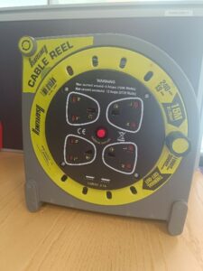 Cable Reel out of the packaging with four Irish/UK Plug sockets and two USB ports.