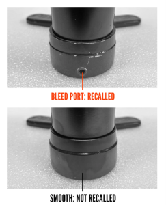 Image of the base of two bicycle pumps, one with a bleed port, the other smooth with no bleed port.