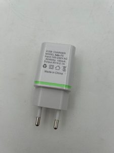 White two-pronged USB charger with no wires on a white background