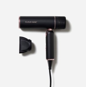 A black hairdryer with the brand Cloud Nine on it.
