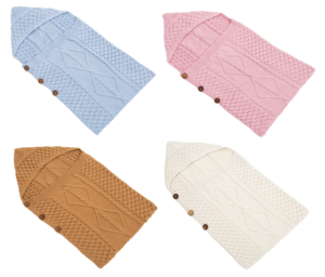 Images shows 4 sleeping nests for babies with aran knitting pattern and in 4 colours, blue, pink, brown and cream